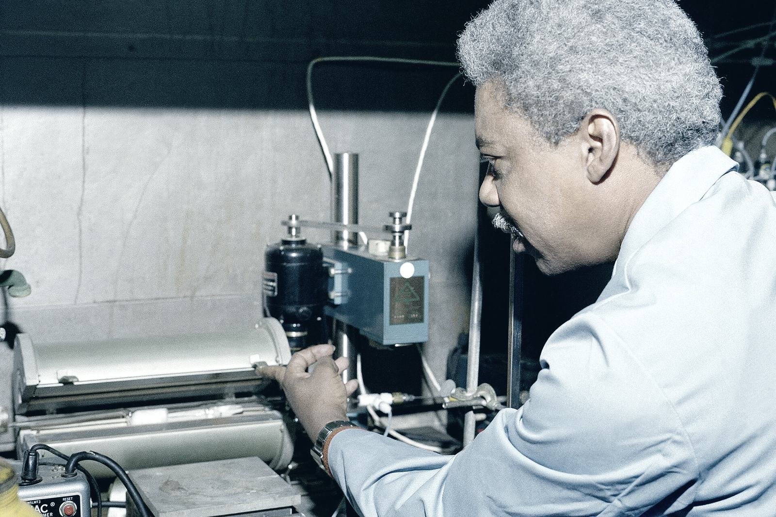 Engineer running a measurement on a test bench